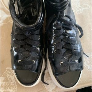 Black open toed paten leather sneakers